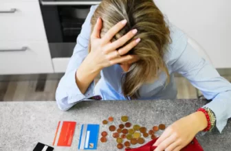 Money Worried Women with cards and empty wallet